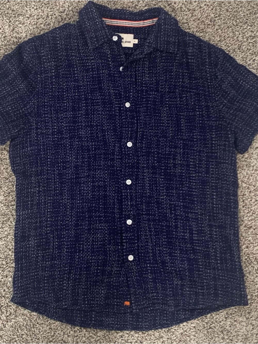 The Normal Brand men’s size medium top.